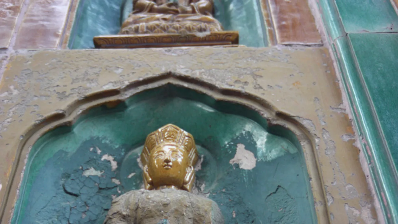 Fejetlenség a kínai Buddha-szobrok között