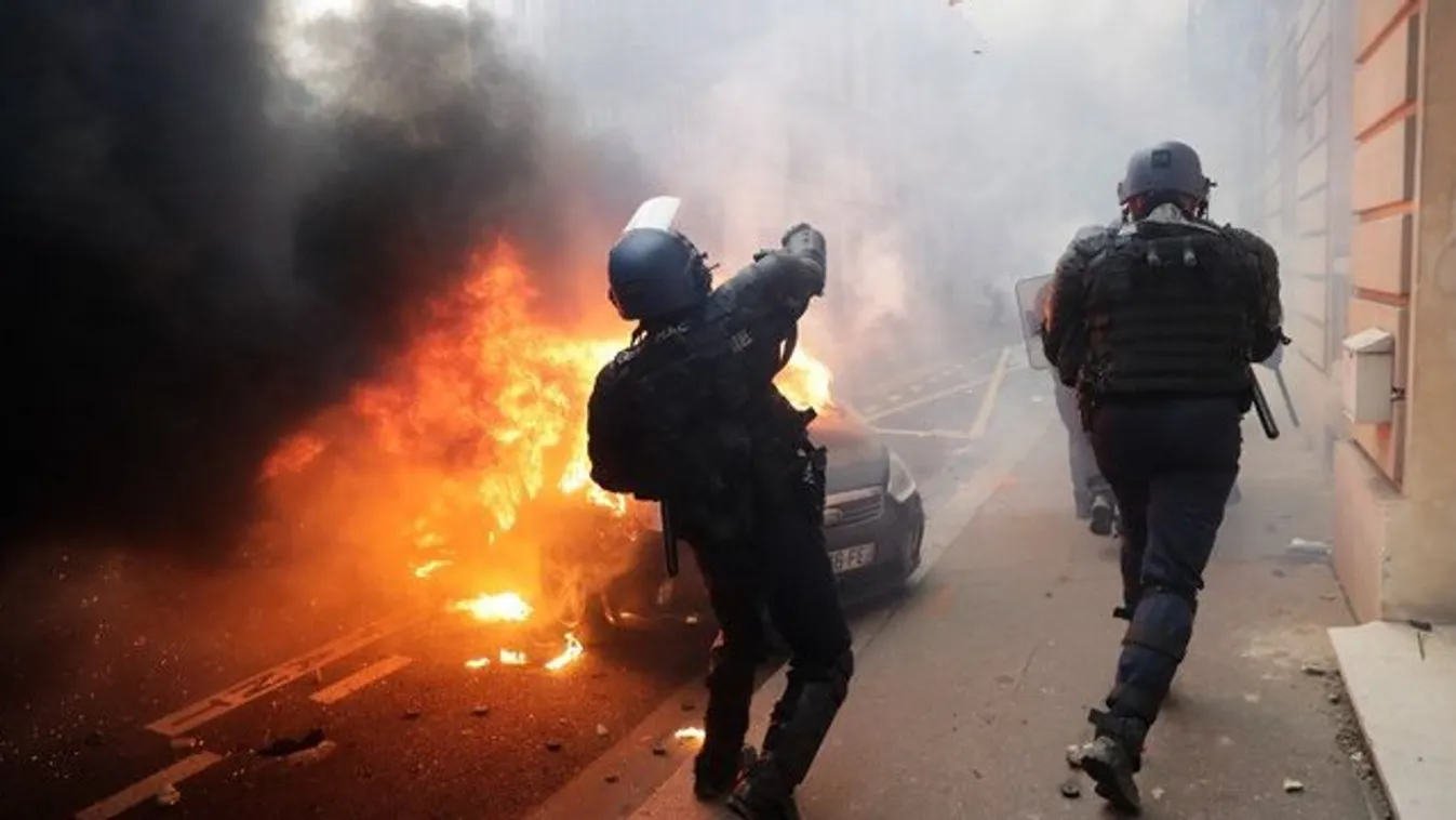 Könnygáz, tűz és betört kirakatok - képeken a francia zavargások