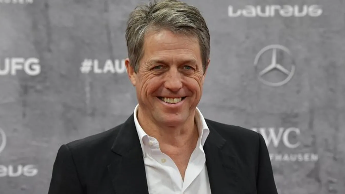 Nincs mit tenni: bénázó lúzerként a legnépszerűbb Hugh Grant - videó