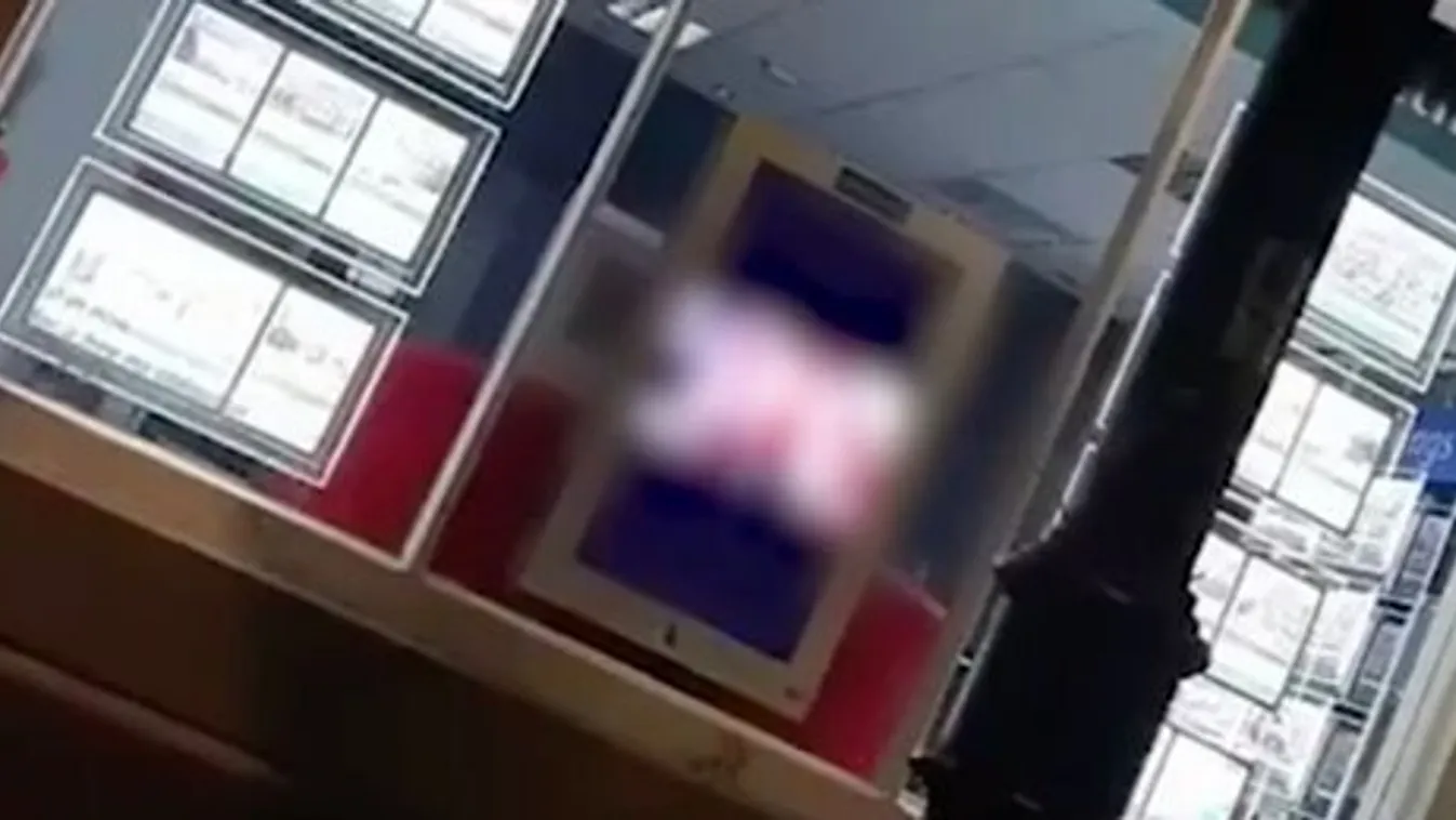 Órákig pornó ment az ingatlaniroda kirakatának kijelzőjén - 18+ videó