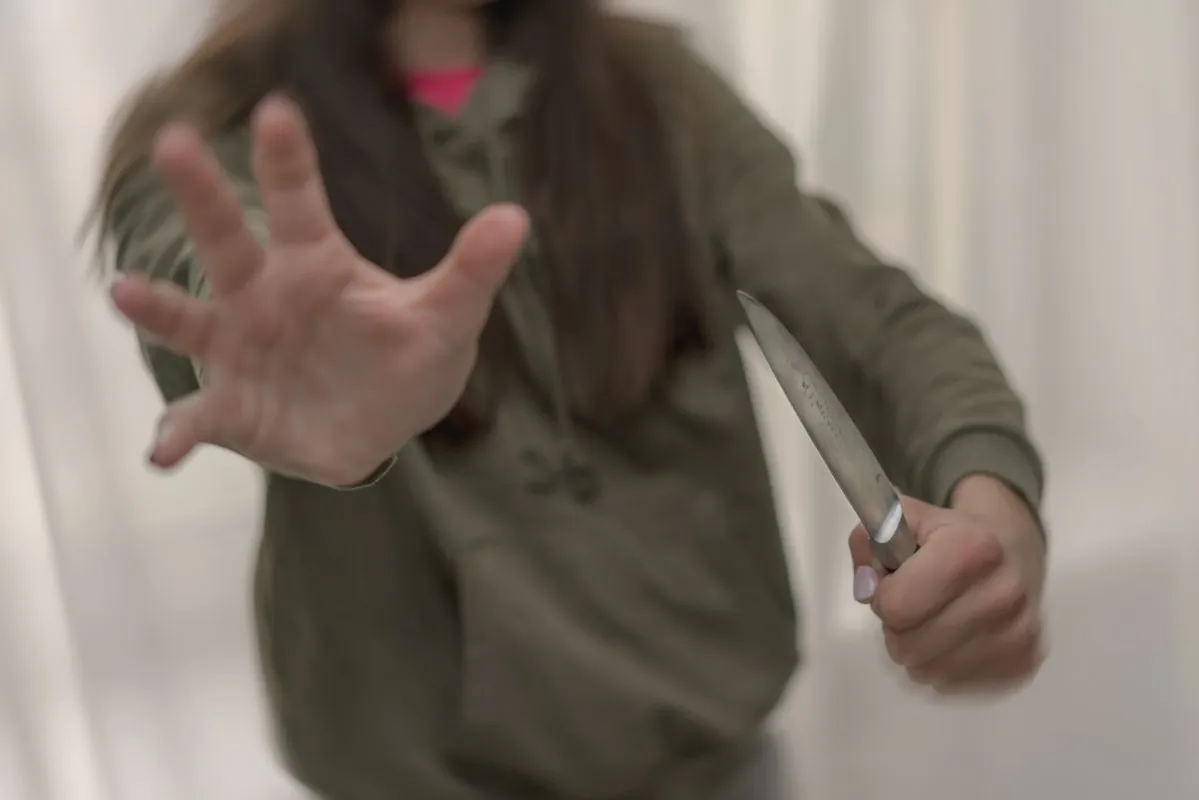 Girl,Defends,Herself,From,Attack,By,Putting,Her,Palm,Forward,
