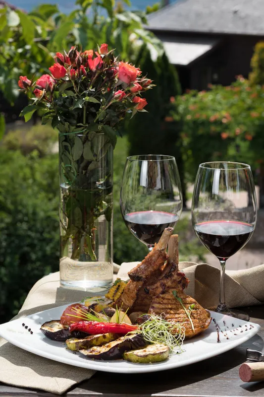 Romantic,Dinner,Outside.,An,Appetizing,Dish,Of,Pork,Ribs,And