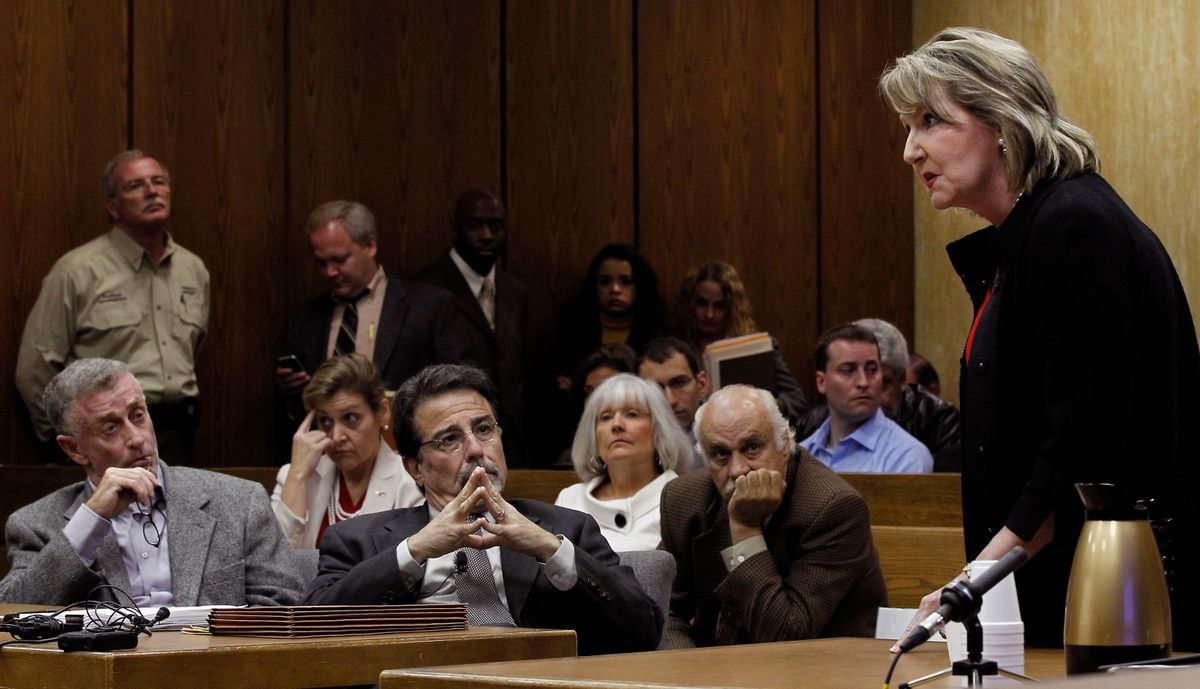 Kathleen Peterson's sister, Candace Zamperini, makes an emotional appeal to Judge Orlando Hudson to continue the hearing because Cline was unprepared. Saying the tenth anniversary of her sister's murder was just days away, Zamperini forcefully argued for more time, staring intently at Michael Peterson as she addressed the judge.Peterson and his legal team began their attack on former State Bureau of Investigation agent Duane Deaver, a key expert witness at Peterson's 2003 trial, which ended in a life sentence for first-degree murder. A jury convicted Peterson of killing his wife, Nortel Networks executive Kathleen Peterson, who died in a pool of blood at the bottom of a blood-spattered staircase in the Petersons' Forest Hills mansion in December 2001. (Chuck Liddy/Raleigh News & Observer/Tribune News Service via Getty Images)