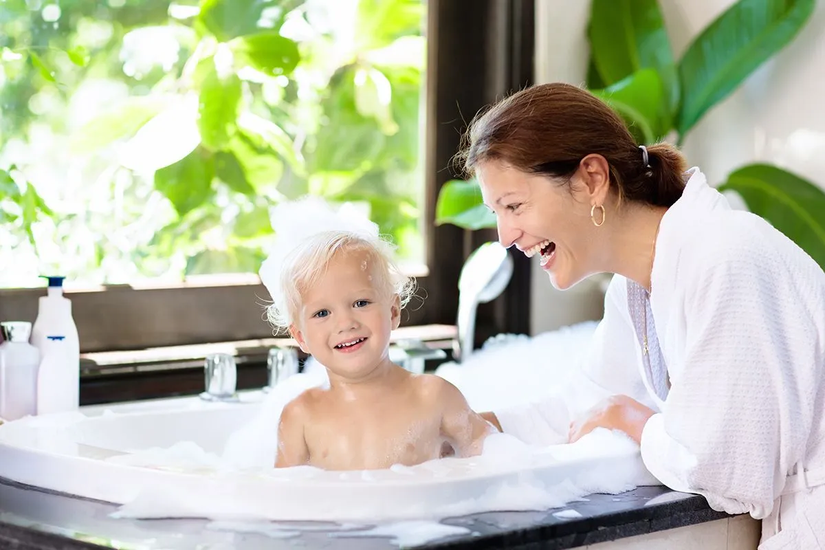 Little,Child,Taking,Bubble,Bath,In,Beautiful,Bathroom,With,Big