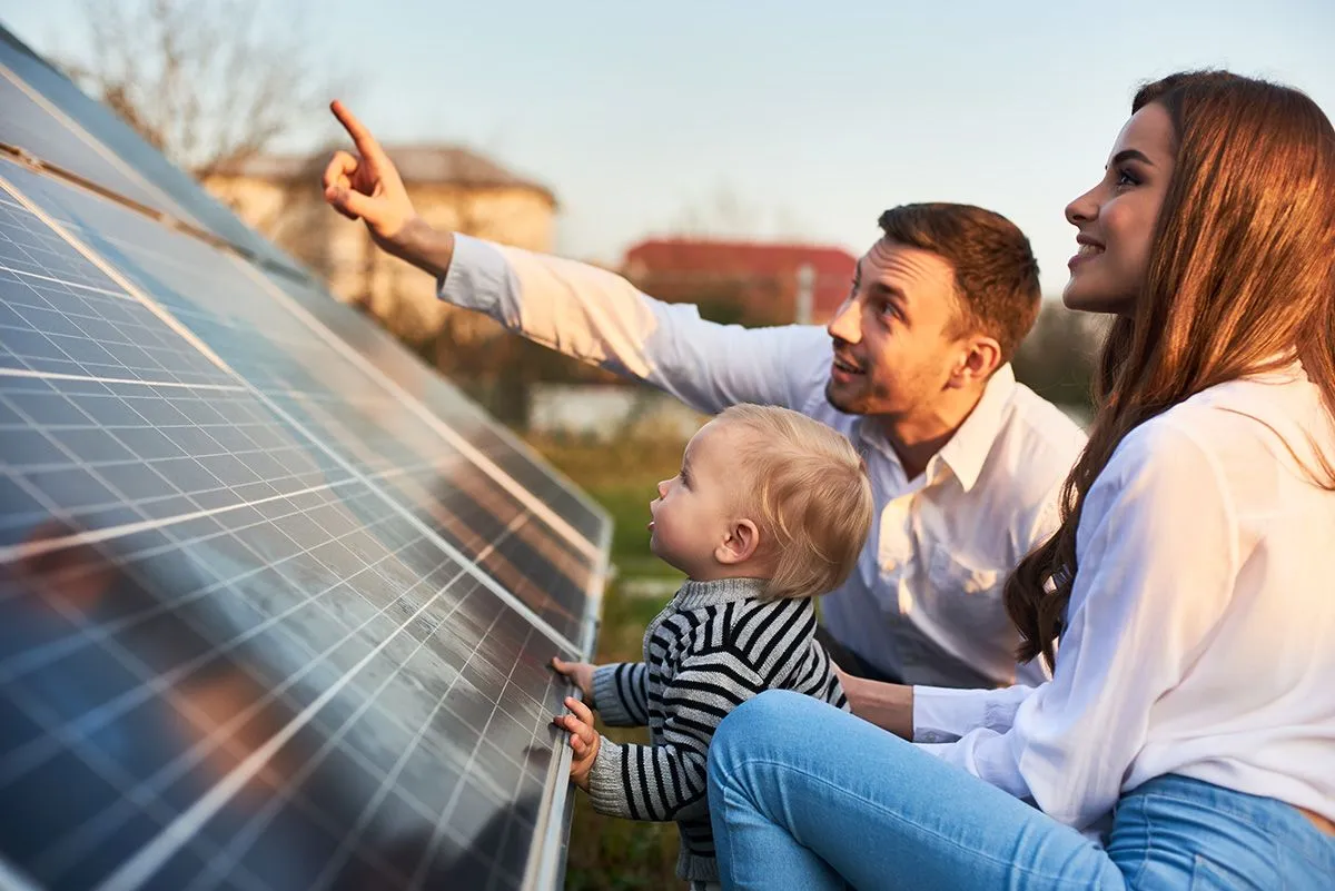 Man,Shows,His,Family,The,Solar,Panels,On,The,Plot