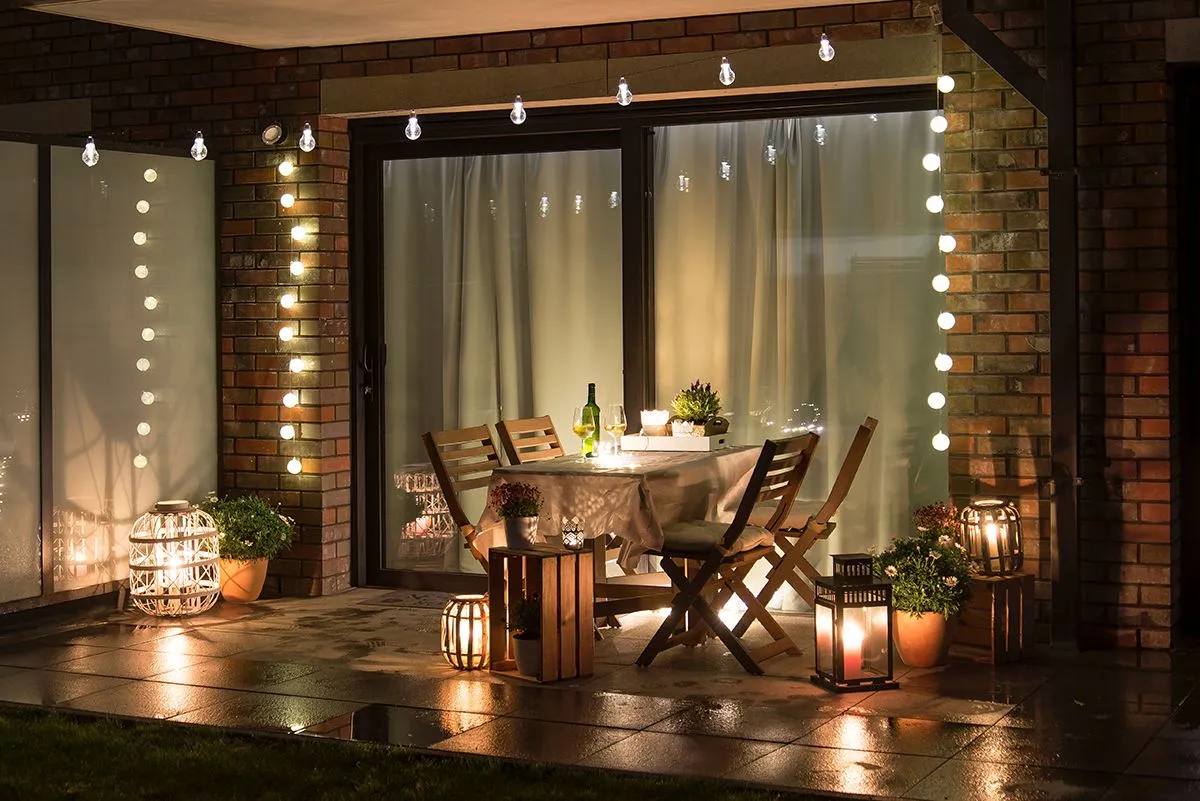 Summer,Evenig,Terrace,With,Candles,,Wine,And,Lights