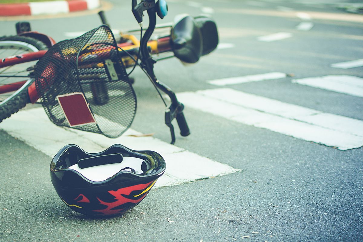 Helmet,And,Bike,Lying,On,The,Road,On,A,Pedestrian