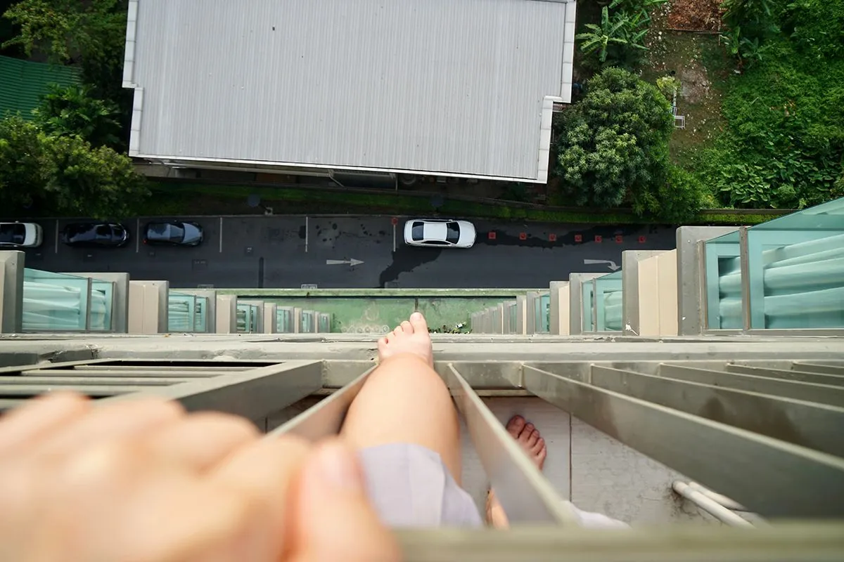 Part,Of,Woman,Body,,Hand,Holding,Balcony,Railing,And,Her