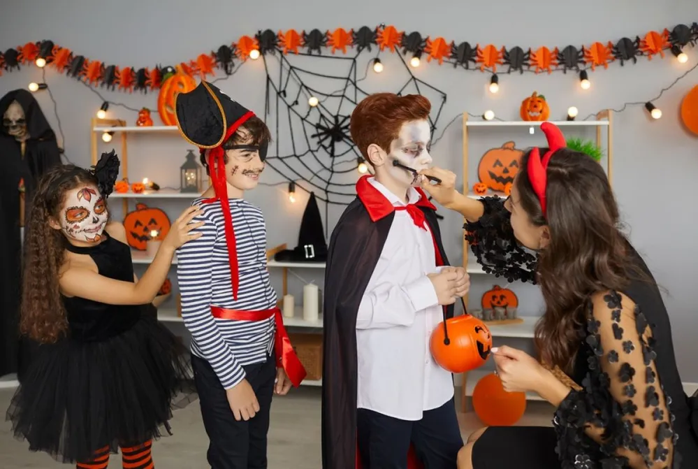 Halloween,Children's,Makeup.,Young,Woman,Prepares,Children,For,Costume,Party