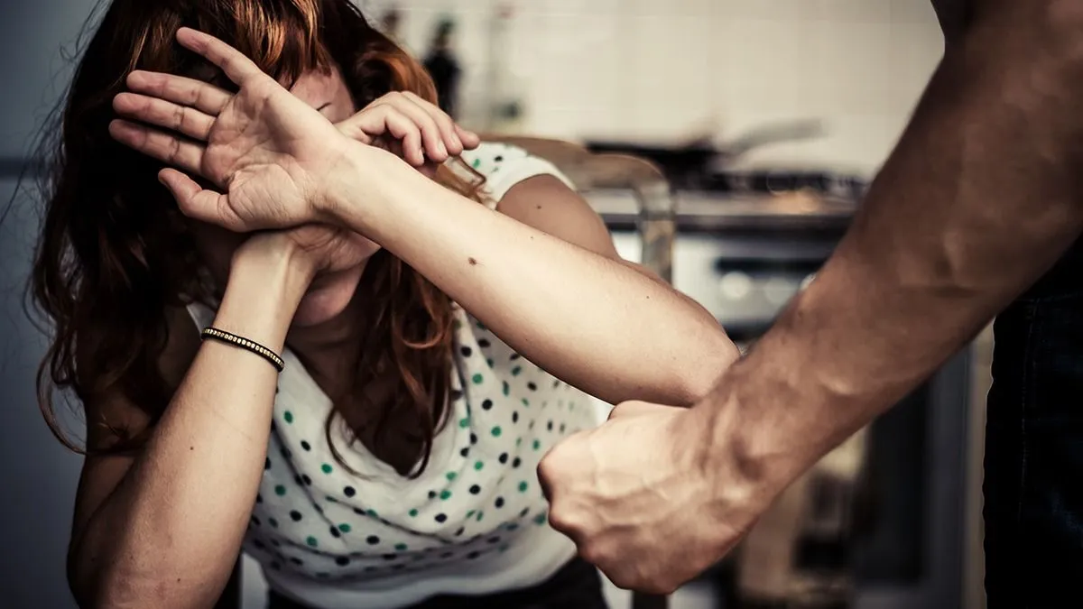 Woman,Covering,Her,Face,In,Fear,Of,Domestic,Violence