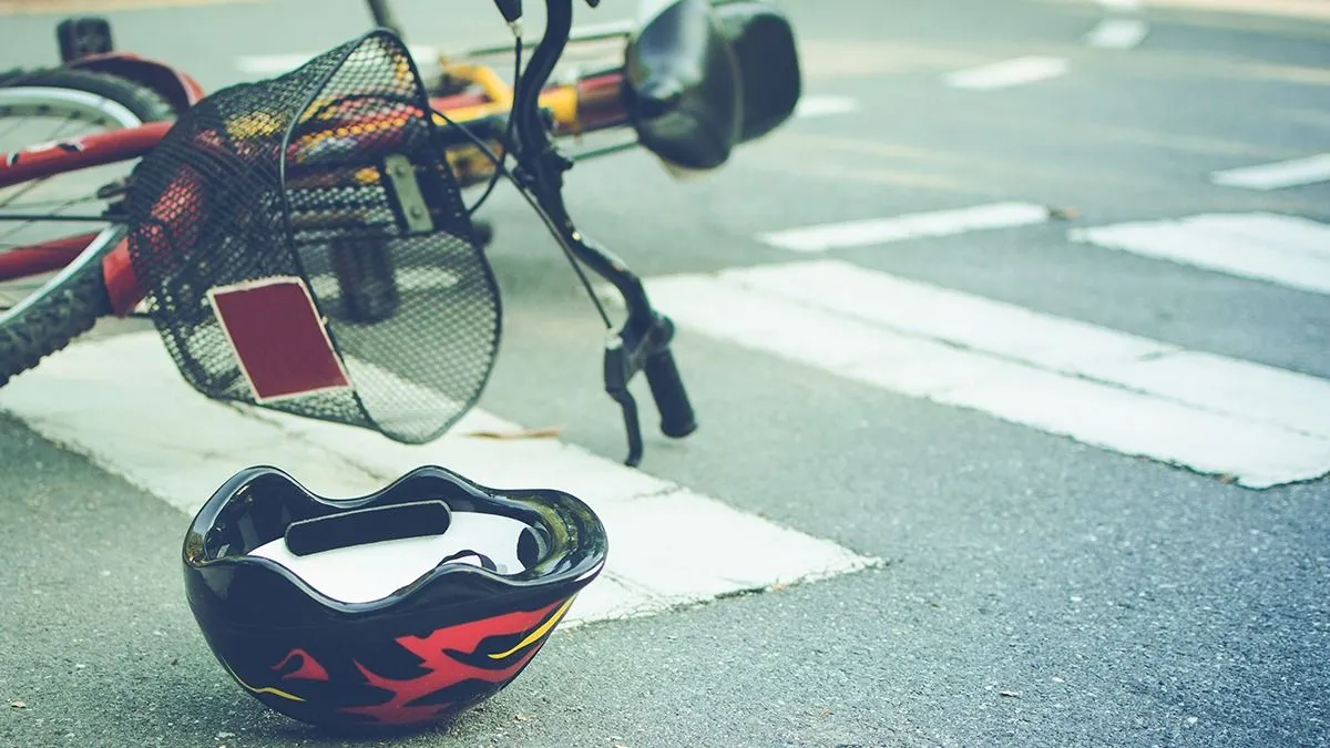 Helmet,And,Bike,Lying,On,The,Road,On,A,Pedestrian