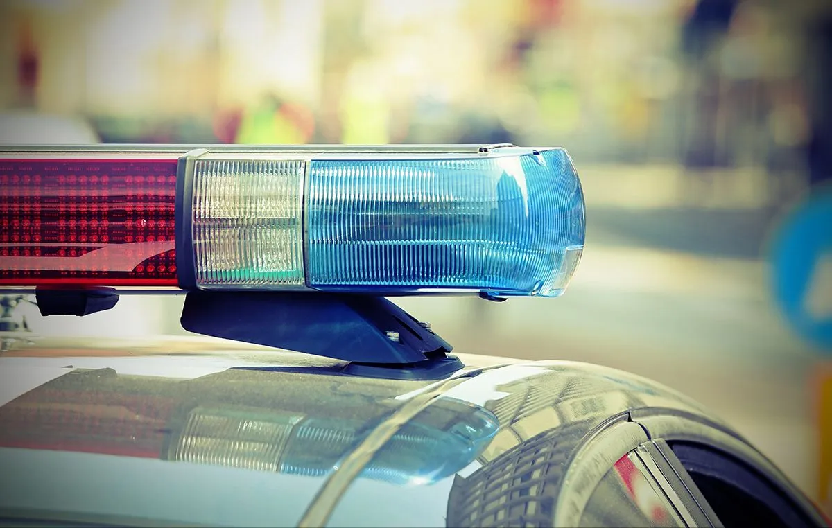 Flashing,Lights,Of,The,Police,Car,Into,The,Checkpoint,In
