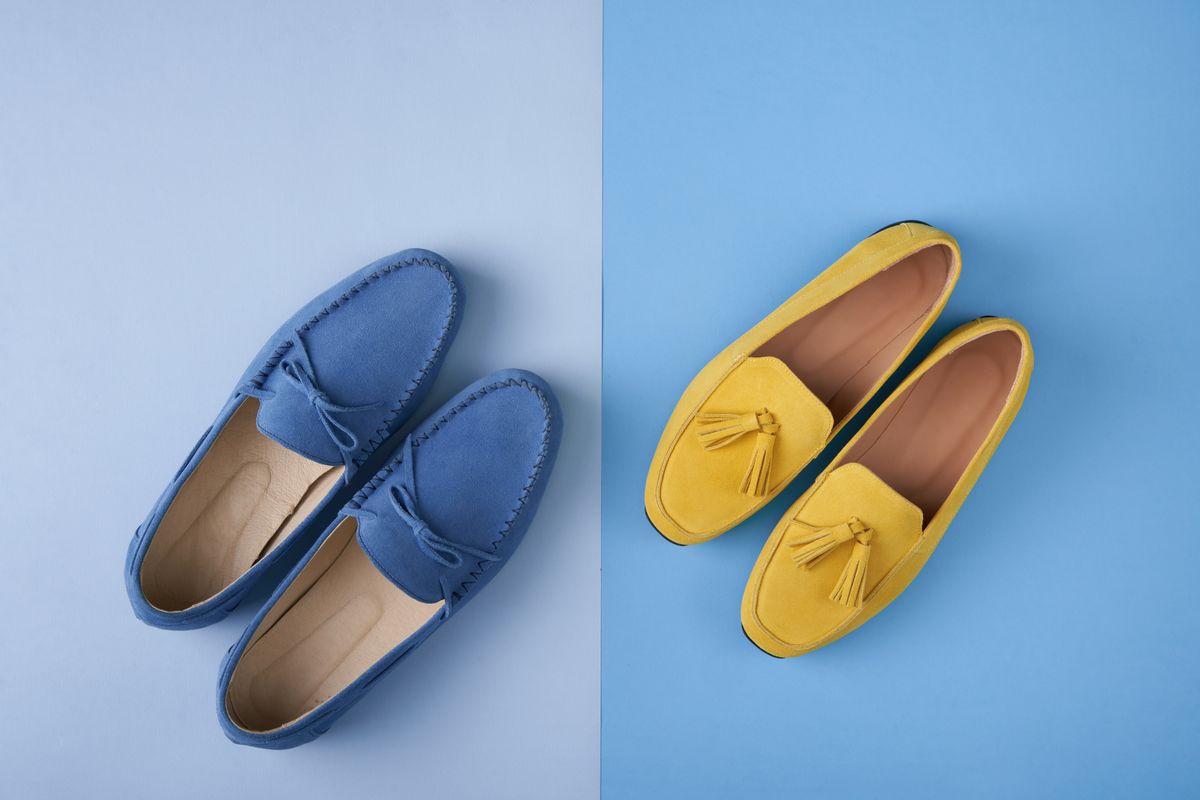 Blue,Suede,Man's,And,Yellow,Woman's,Moccasins,Shoes,Over,Blue