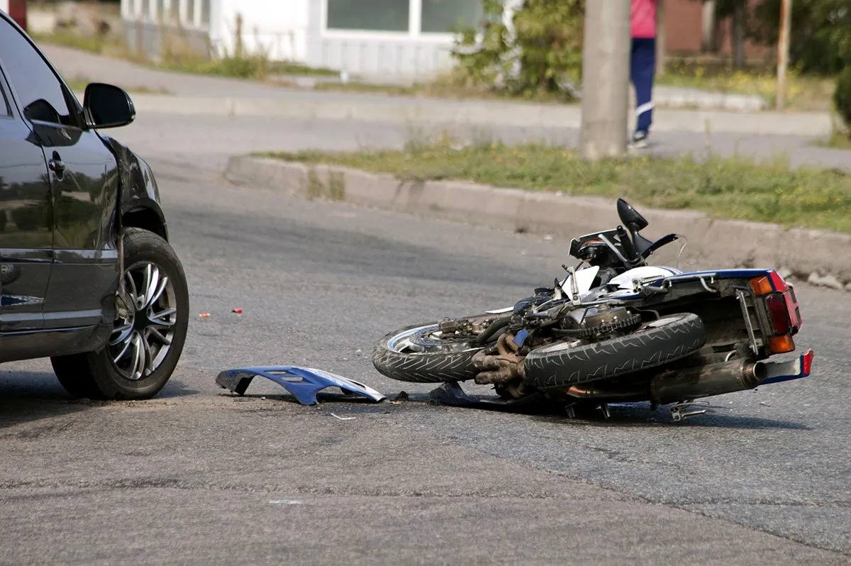 Crash,Moto,Bike,And,Car,On,Road