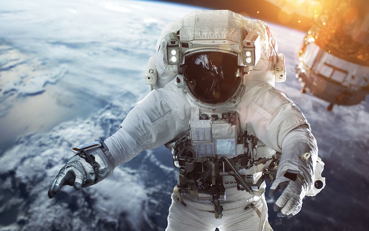 Brave,Astronaut,At,The,Spacewalk,At,The,Earth,Orbit.,People