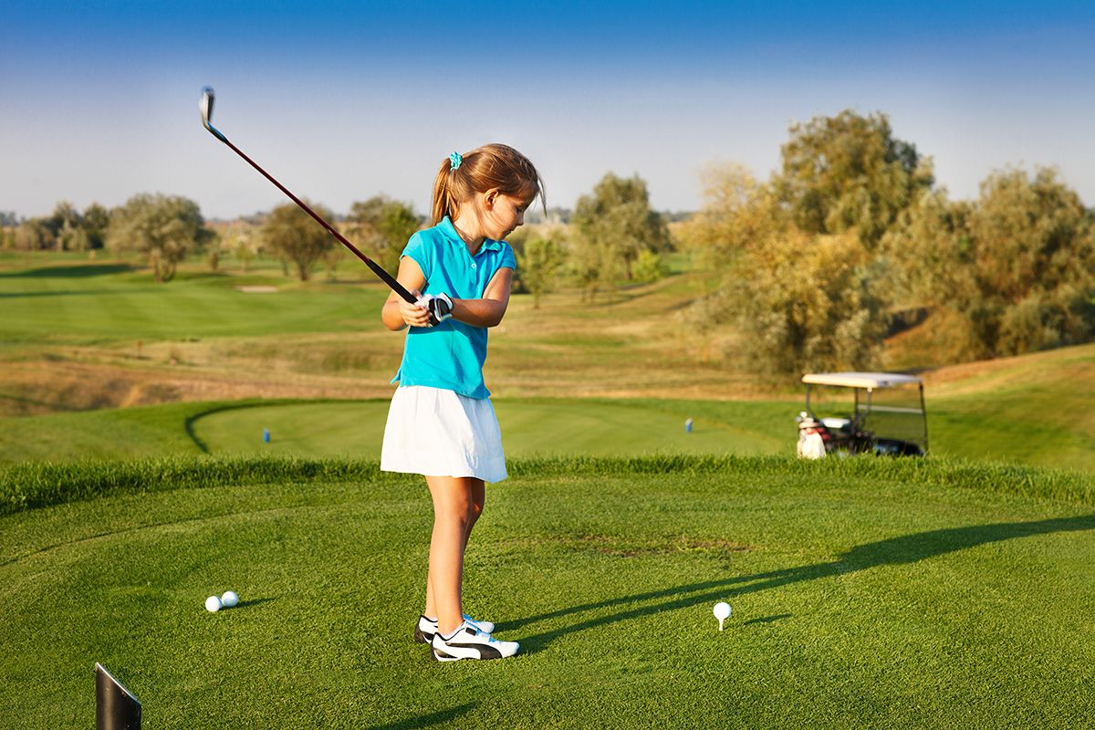 Cute,Little,Girl,Playing,Golf,On,A,Field,Outdoor.,Summertime