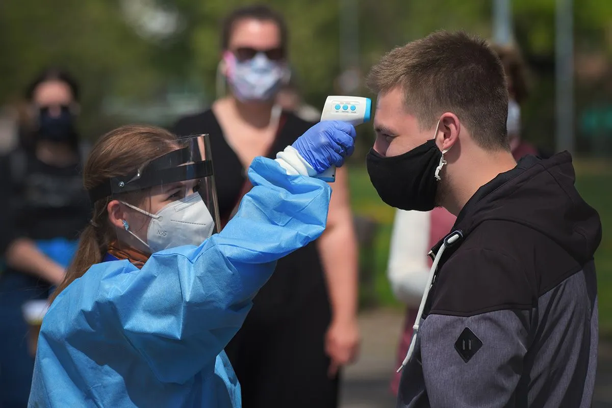Brno,,Czech,Republic,-,April,24,2020:,Female,Medic,Checking
