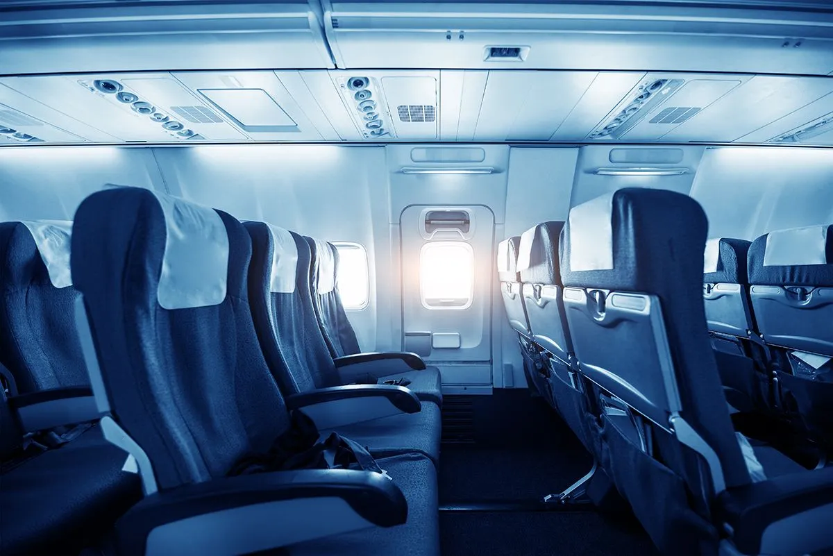 Comfortable,Seats,In,Cabin,Of,Huge,Aircraft,With,Screens,In