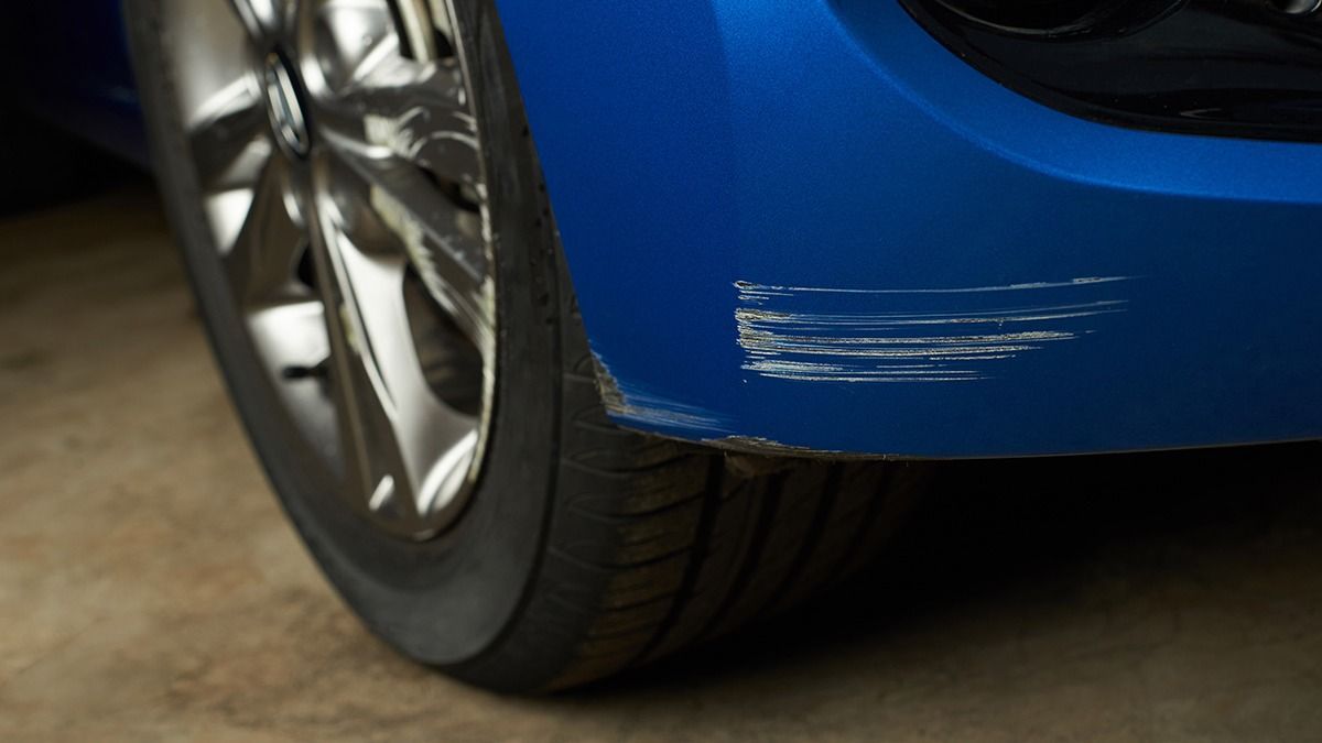 Dent,Car,Scratch,Close-up.,Crashed,Car,In,Accident