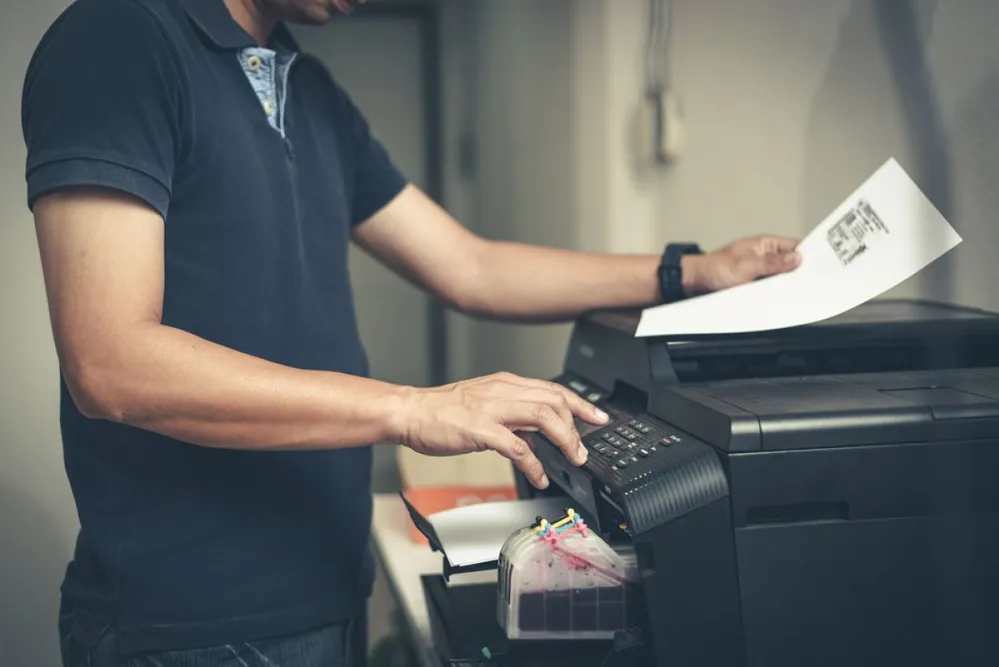 Bussiness,Man,Hand,Press,Button,On,Panel,Of,Printer747650746