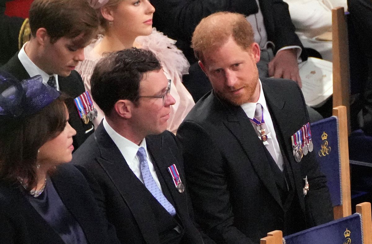 (L to R) Britain's Princess Eugenie of York, Jack Brooksbank and Britain's Prince Harry, Duke of Sussex attend the coronation ceremony of King Charles III and Queen Camilla in Westminster Abbey in central London on May 6, 2023. - The set-piece coronation is the first in Britain in 70 years, and only the second in history to be televised. Charles will be the 40th reigning monarch to be crowned at the central London church since King William I in 1066. Outside the UK, he is also king of 14 other Commonwealth countries, including Australia, Canada and New Zealand. Camilla, his second wife, will be crowned queen alongside him and be known as Queen Camilla after the ceremony. (Photo by Aaron Chown / POOL / AFP)