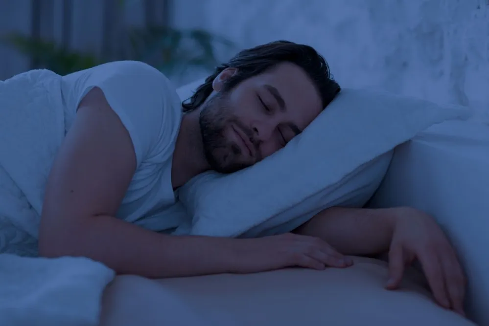 Peaceful,Handsome,Bearded,Young,Man,Sleeping,In,Comfortable,Bed,Alone