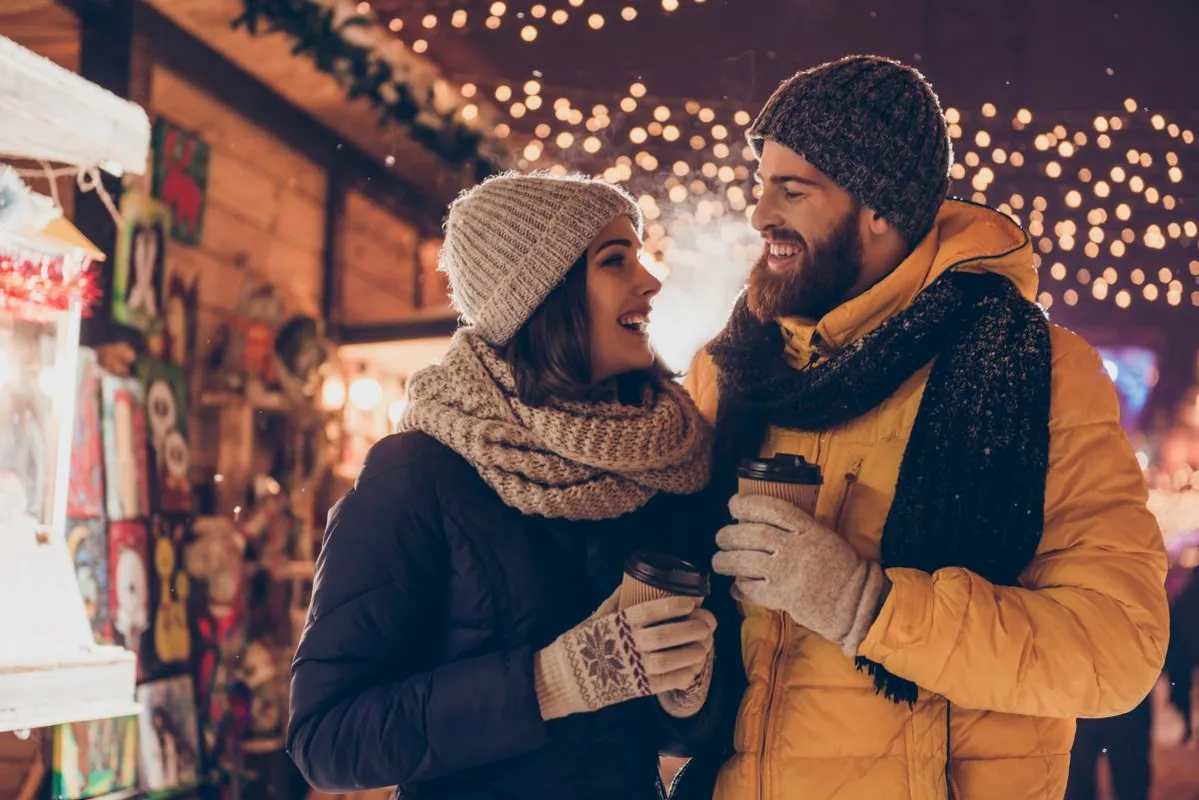 Having,Fun,Together,At,A,Christmas,Fairy.,Young,Cheerful,Couple