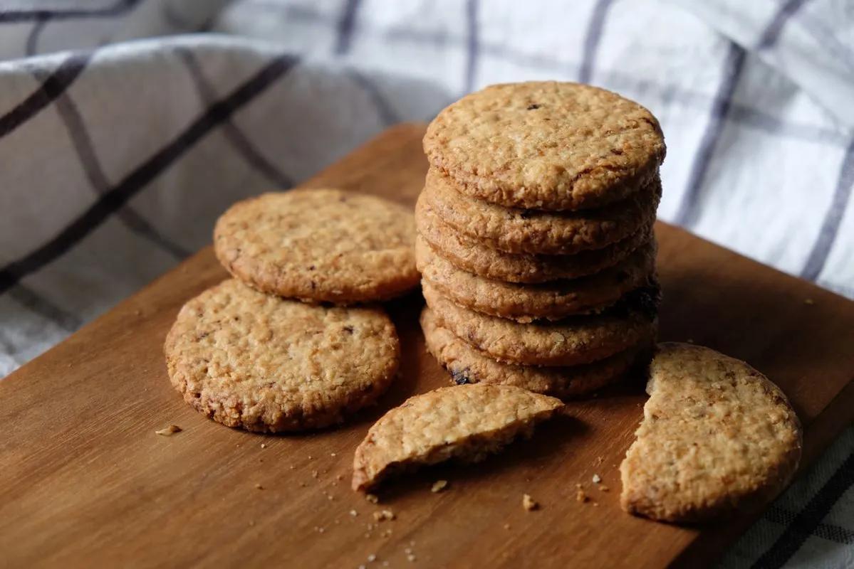 Baked,Oatmeal,Cookies,On,Wood,,White,Fabric,Background