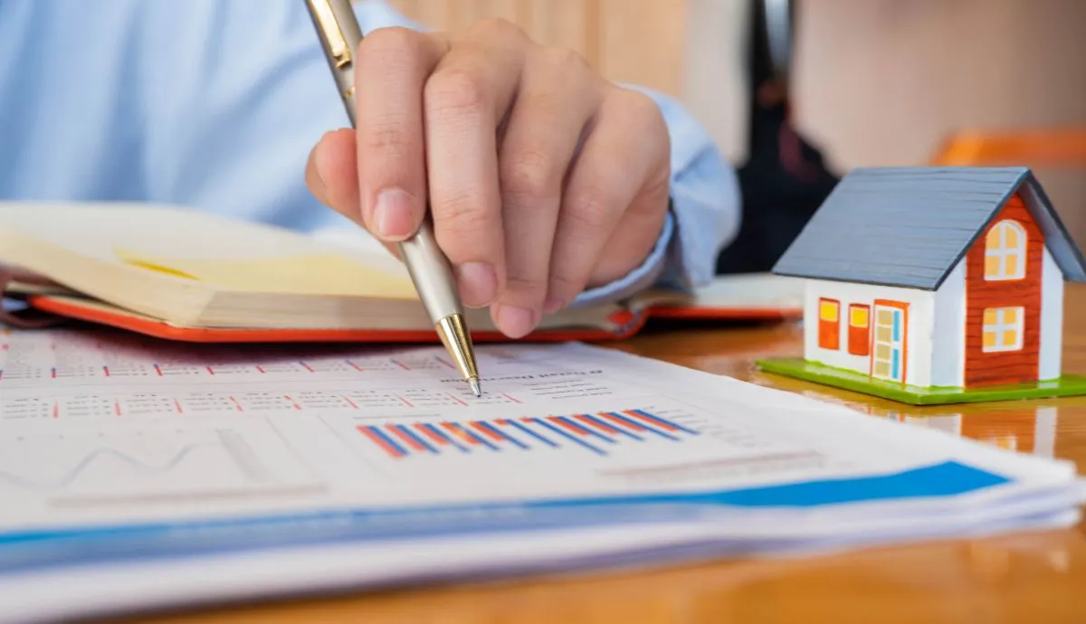 estate agent with customer after contract signature of buying house