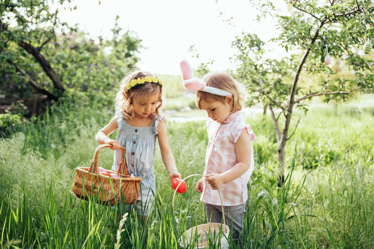 Easter,Egg,Hunt.,Group,Of,Children,Wearing,Bunny,Ears,Running