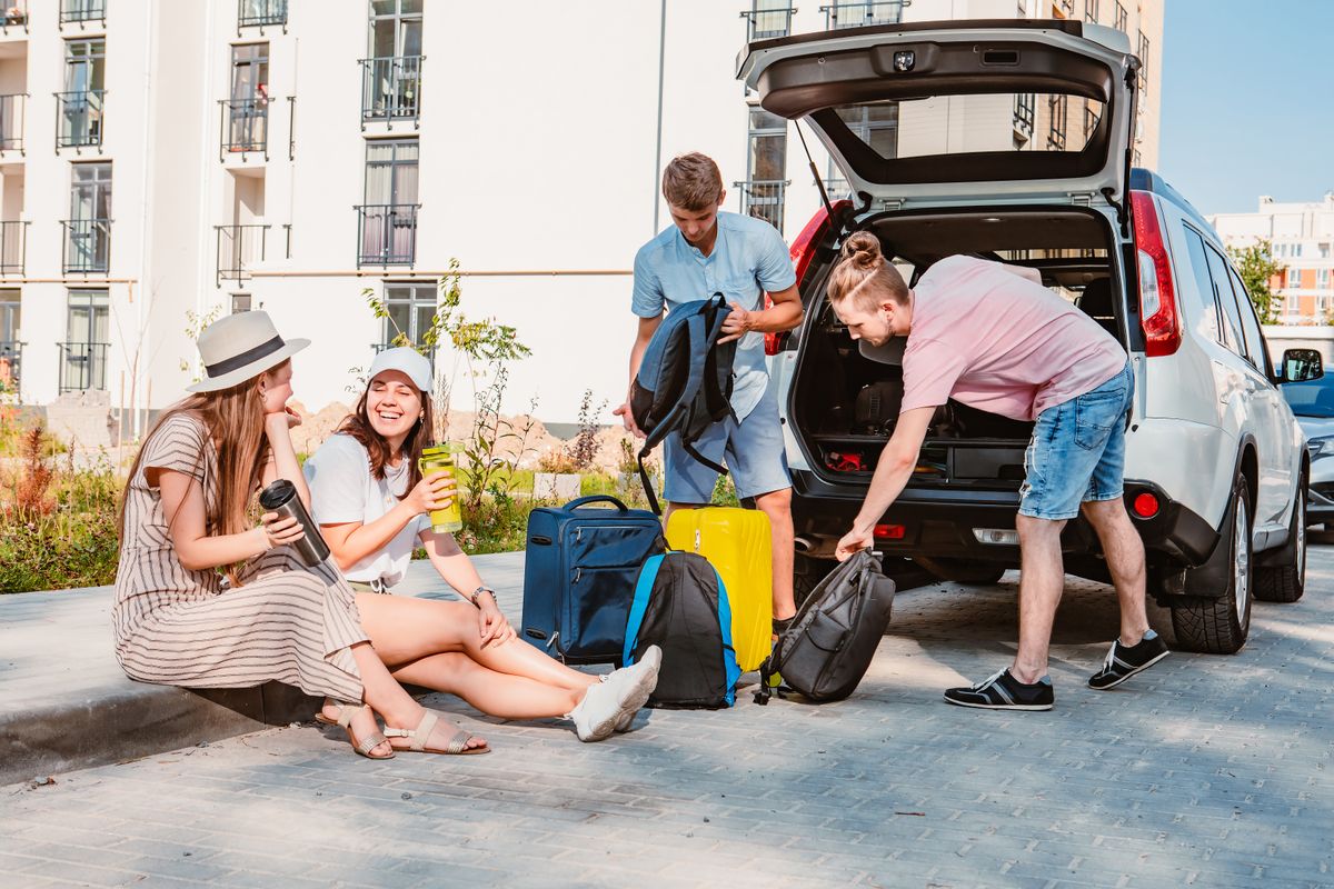 Friends,Load,Car,Trunk,With,Baggage.,Summer,Road,Trip,Vacation.