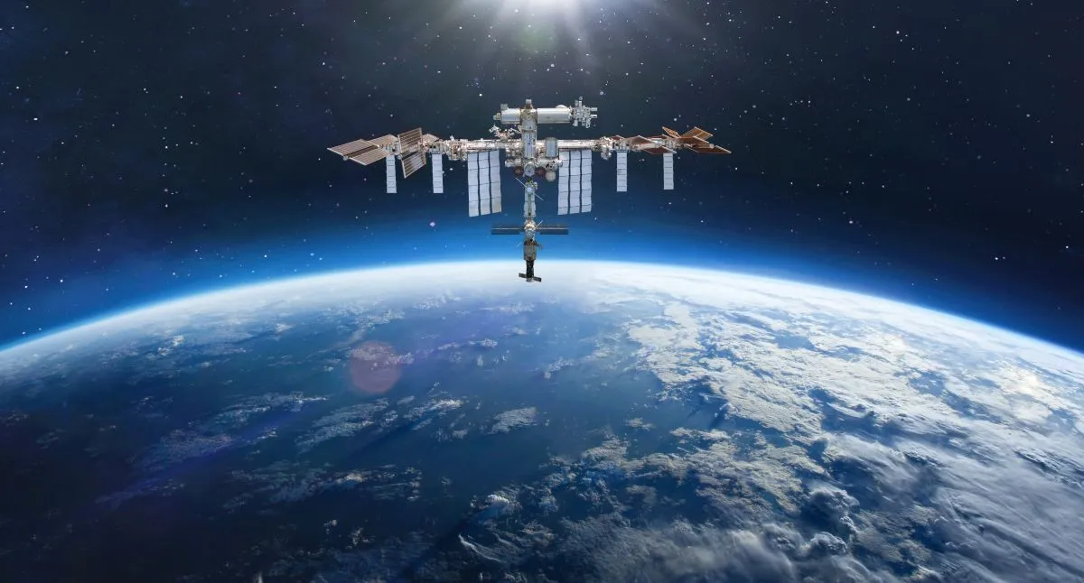 Space,Station,On,Orbit,Of,Earth,Planet.,Blue,Planet,And