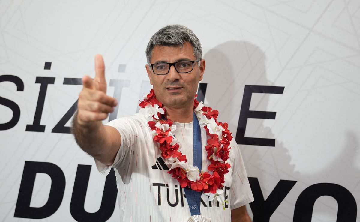Turkish Olympic silver medalist shooter Dikec returned home