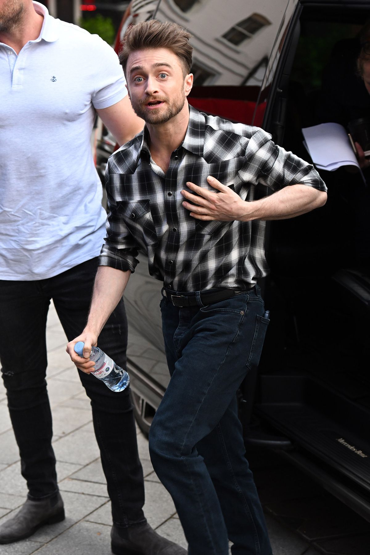 Daniel Radcliffe at Global House and then  arriving at a London Hotel for a day of press for his latest film ‘The Lost City’