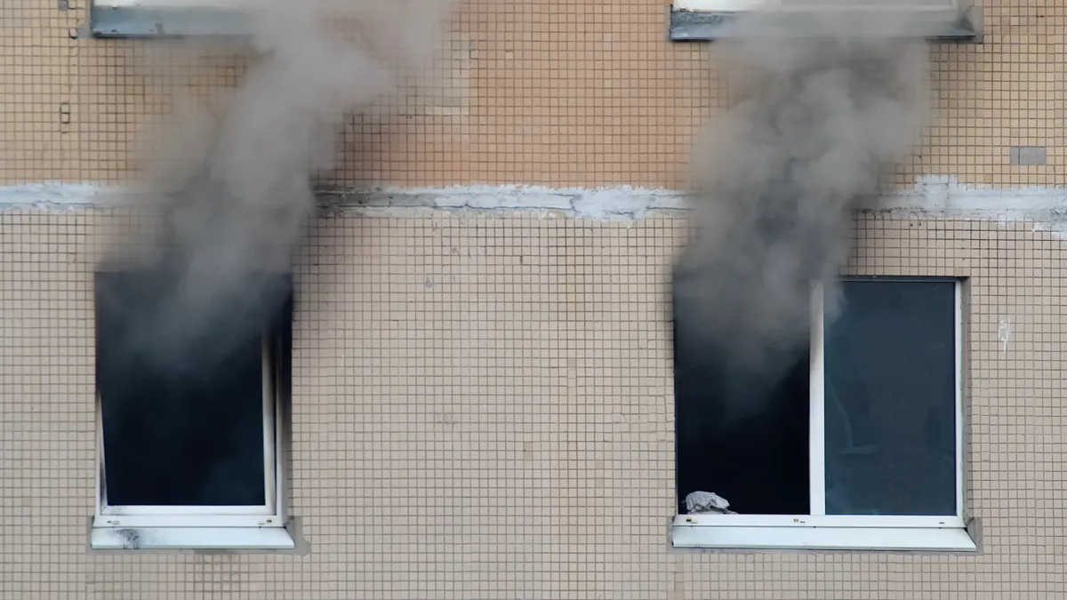 Fire,In,The,Apartment.,Thick,Black,Smoke,Billows,From,Two