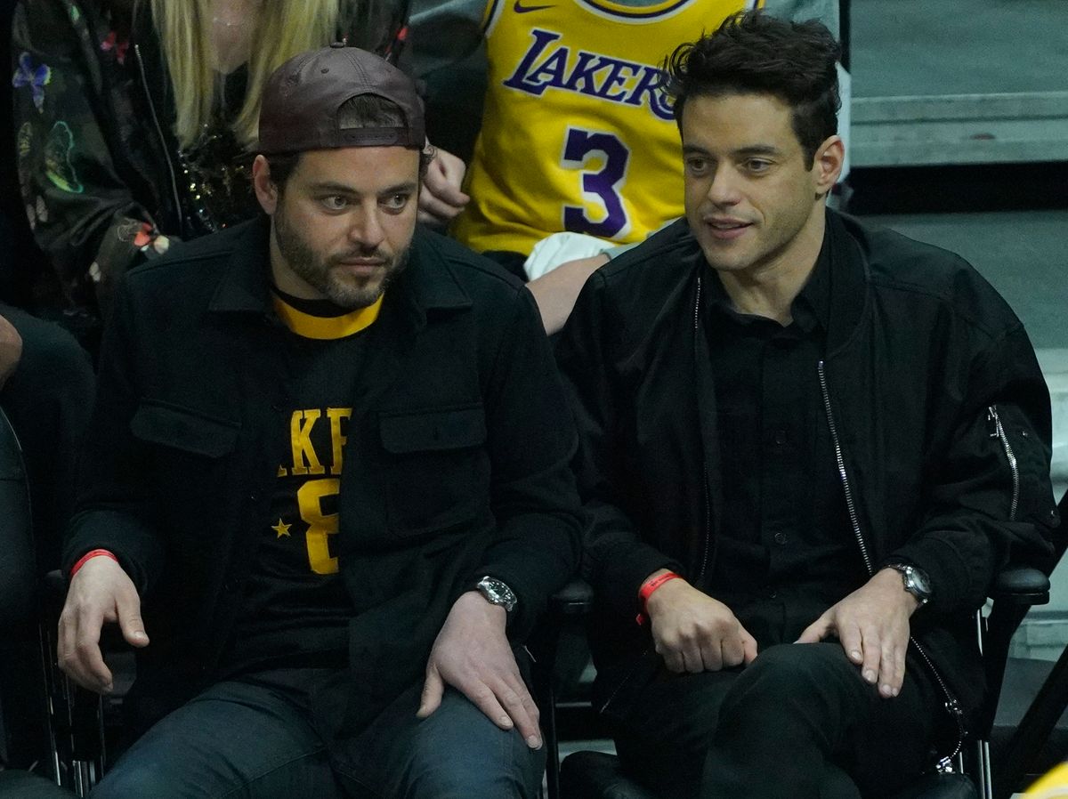 Rami Malek and twin brother Sammi at NBA game between the Los Angeles Lakers and the Los Angeles Clippers on March 3, 2022 at Crypto.com Arena in Los Angeles, CA