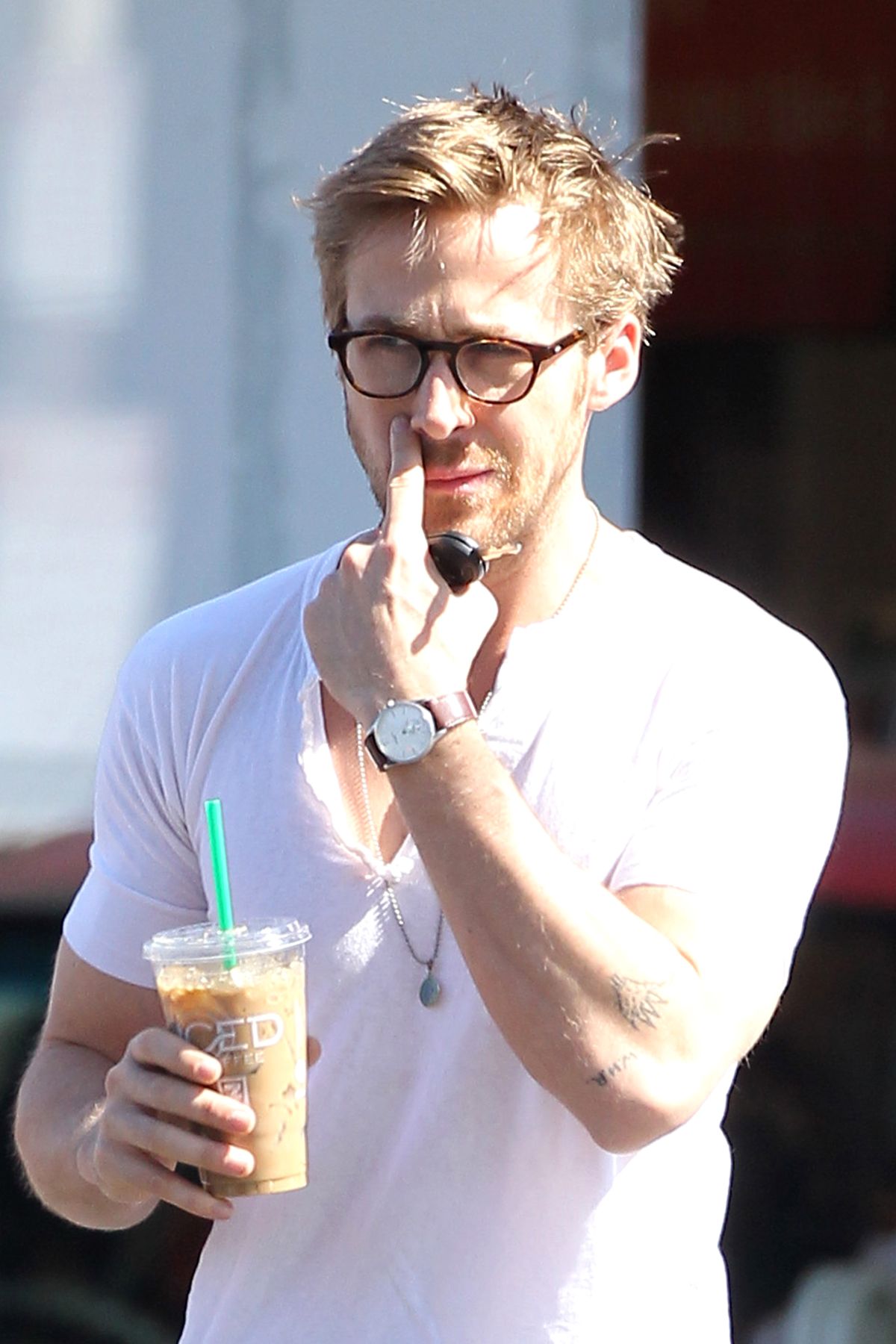 Actor Ryan Gosling suffers a bad case of bedhead as he stops at a local 7-Eleven to pick his morning iced coffee