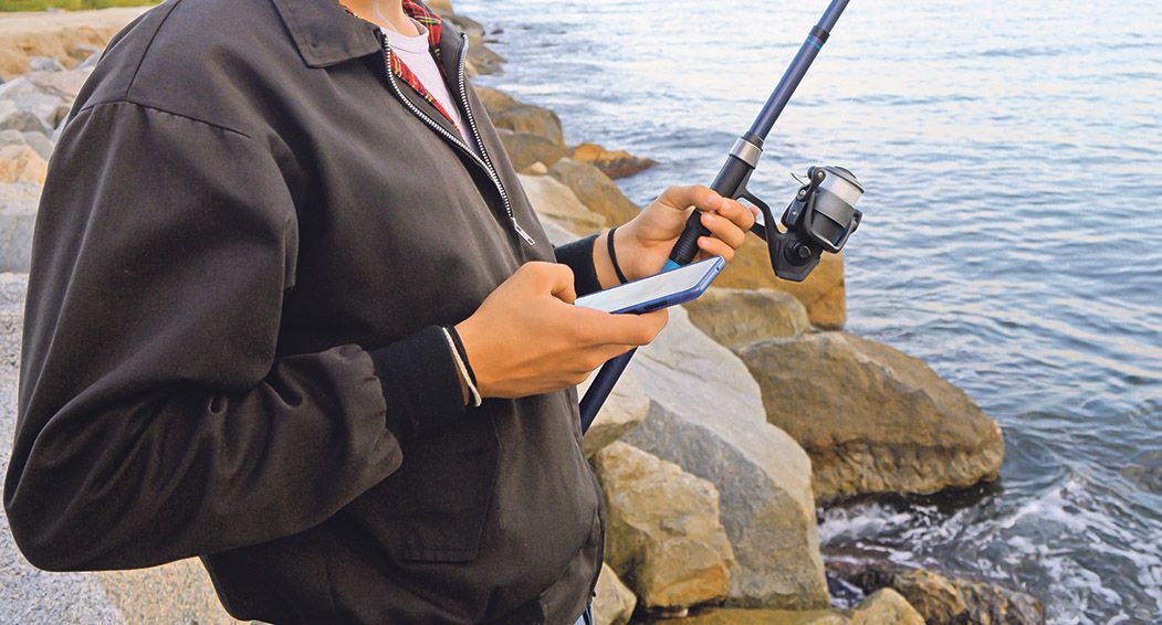 Close,Up,Of,A,Young,Caucasian,Boy,Holding,A,Fishing