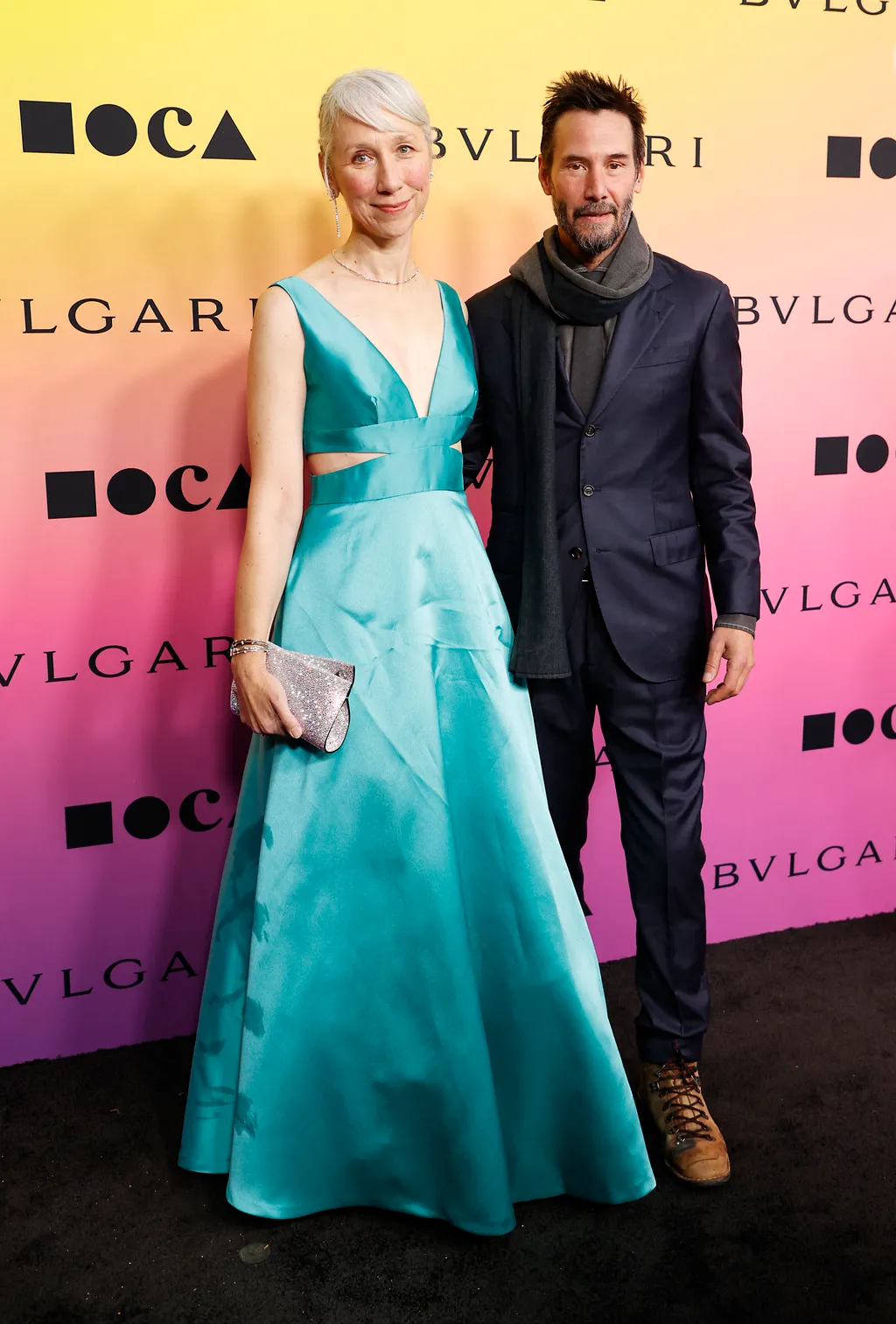 US visual artist Alexandra Grant (L) and US actor Keanu Reeves (R) arrive for the MOCA Gala 2024 at the Geffen Contemporary at MOCA (Museum of Contemporary Art) in Los Angeles, April 13, 2024. (Photo by Michael Tran / AFP)