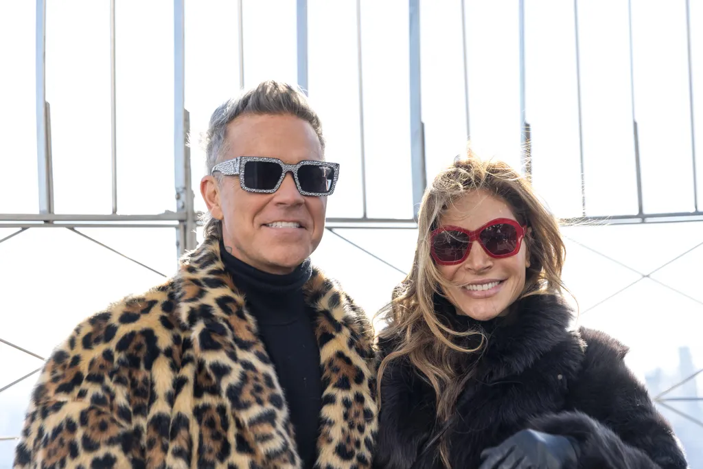 Robbie Williams, Ayda Field visit the Empire State Building to celebrate the release of the film "Better Man"