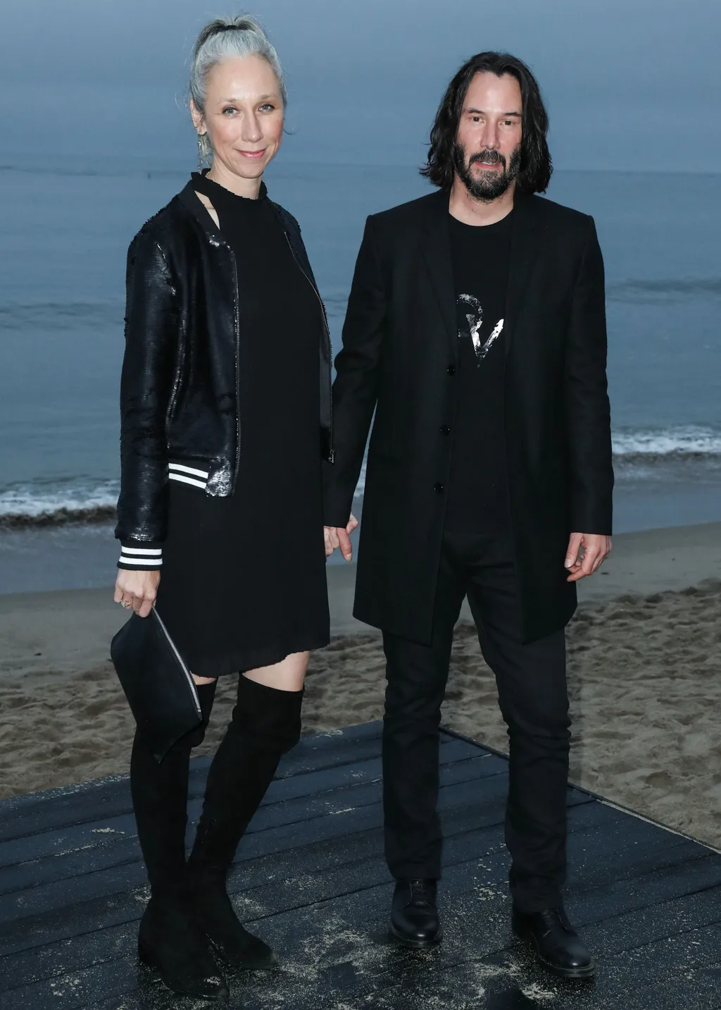 MALIBU, LOS ANGELES, CALIFORNIA, USA - JUNE 06: Alexandra Grant and Keanu Reeves arrive at the Saint Laurent Mens Spring Summer 20 Show held at Paradise Cove Beach on June 6, 2019 in Malibu, Los Angeles, California, United States. (Photo by Xavier Collin/