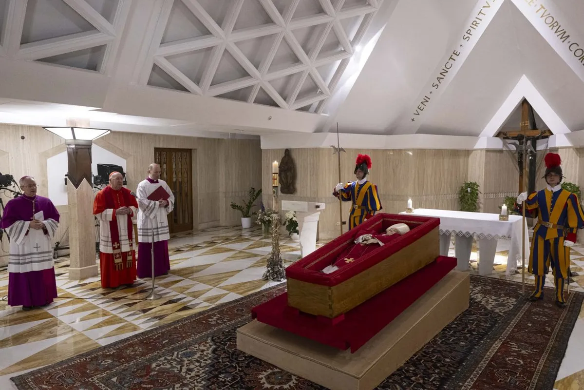 Vatican Secretary of State prays beside Pope Francis' body at Santa Marta Chapel