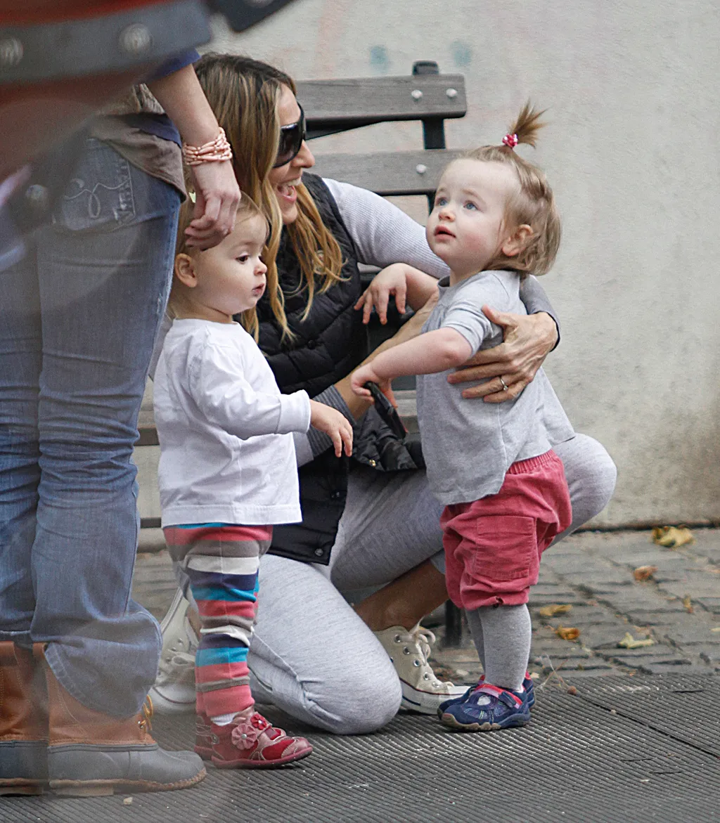 Sara Jessica Parker is seen with twin daughters Samantha and Tabitha Broderick on the streets of Manhattan on October 23, 2010 in New York, New York.