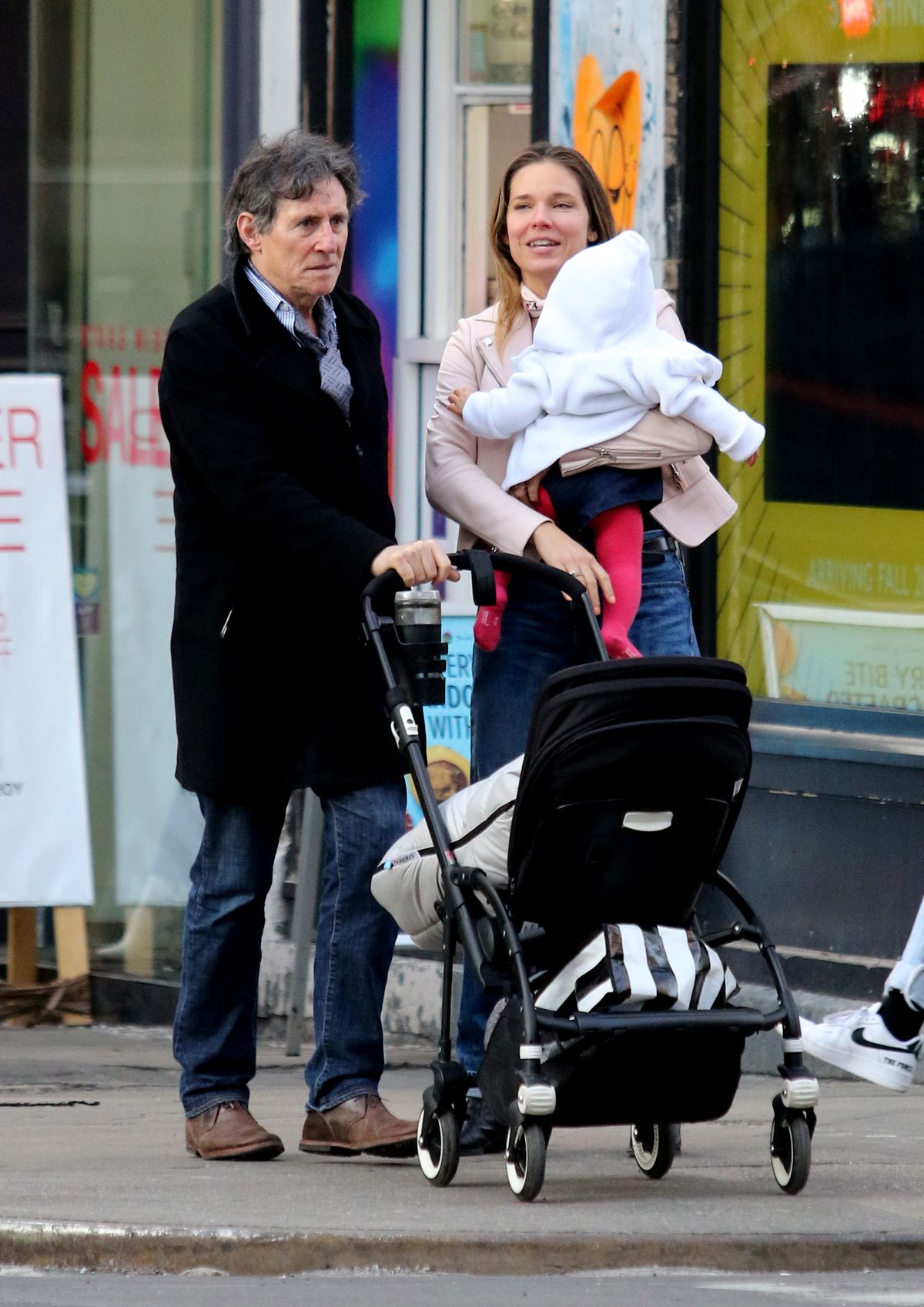 Gabriel Byrne romantic stroll with wife and baby in NYC
