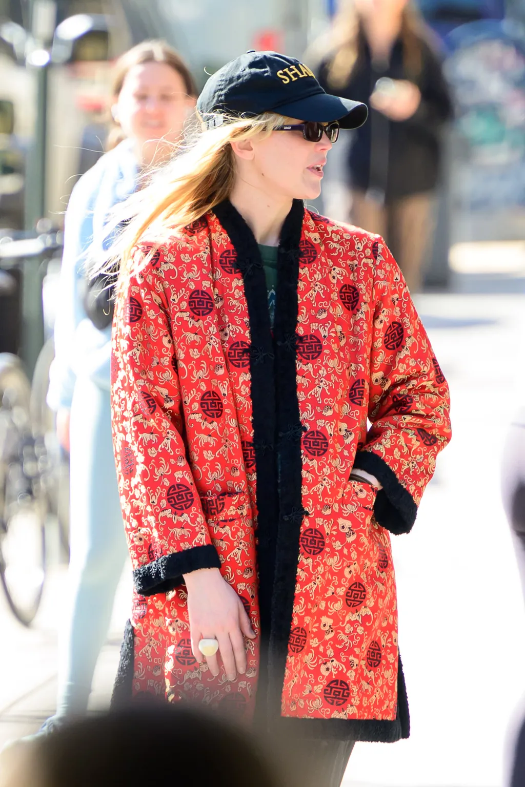 04/29/2025 Jennifer Lawrence is pictured stepping out in New York City. The American actress and new mom wore a baseball cap, red Kimono style jacket, pinstripe trousers, and black trainers.

sales@theimagedirect.com Please byline:TheImageDirect.com