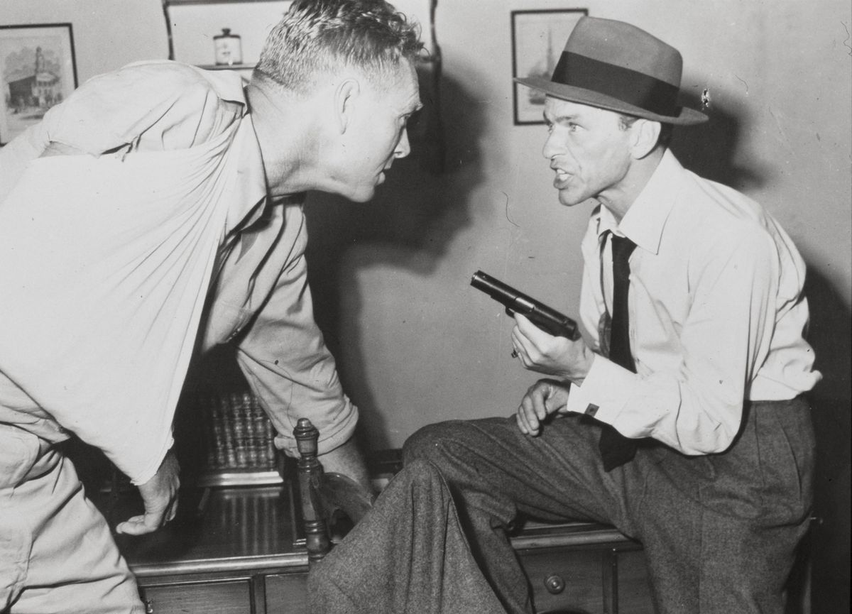 FRANK SINATRA  and STERLING HAYDEN  in SUDDENLY (1954).