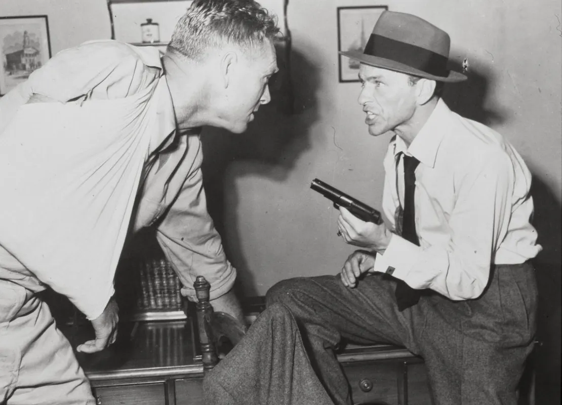 FRANK SINATRA  and STERLING HAYDEN  in SUDDENLY (1954).