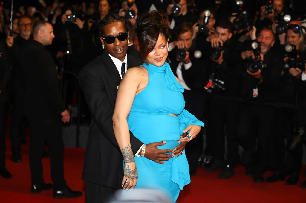 RIHANNA and husband A ROCKY leave the red carpet after the 'Highest 2 Lowest' Premiere screening at the 78th Annual Cannes Film Festival at Palais des Festivals in Cannes, France