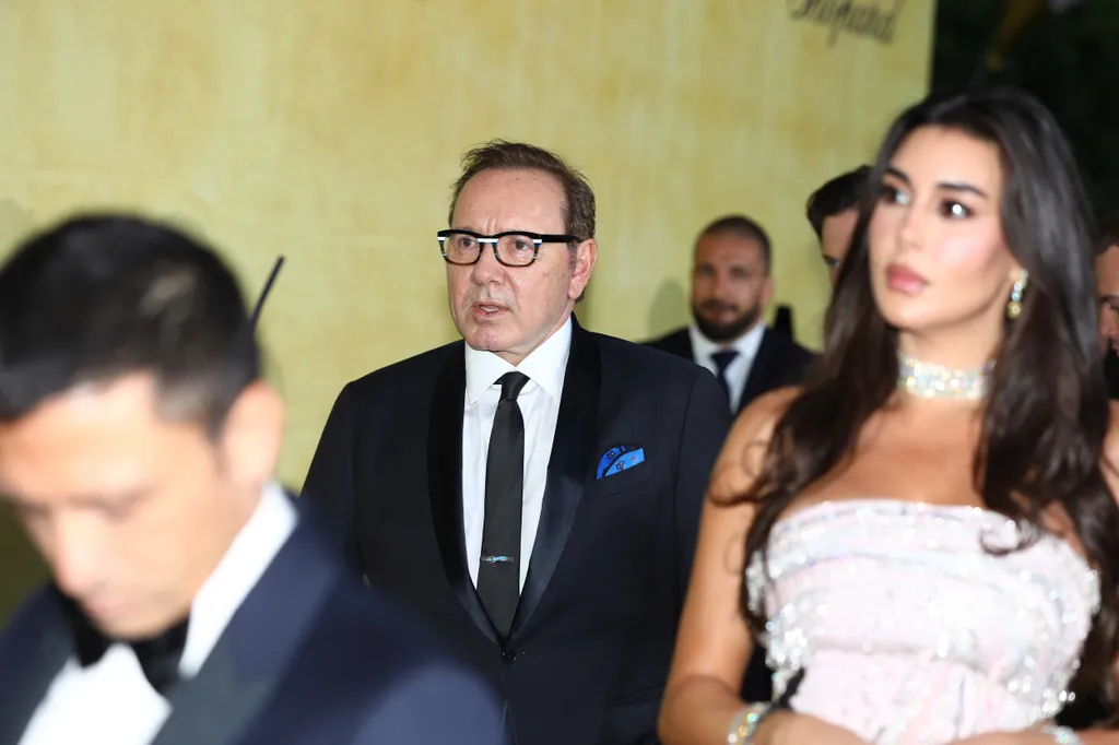 KEVIN SPACEY poses during the photocall for the amfAR Gala Cannes in Antibes, France