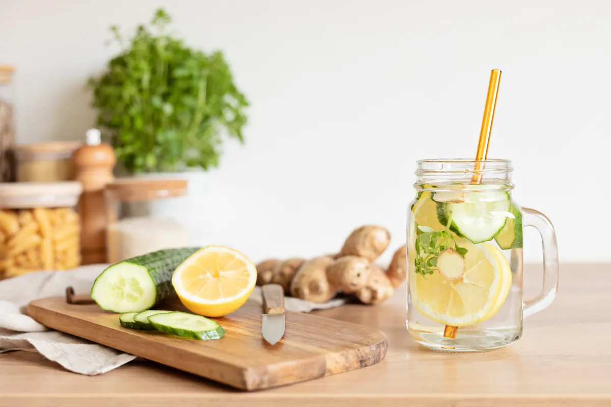Infused,Water,With,Cucumber,,Lemon,And,Ginger,In,Glass,Bottle